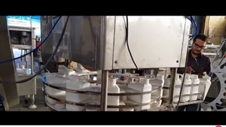 دستگاه پرکن کود مایع | دستگاه پرکن و دربند کود مایع | دستگاه منو بلاک کود و سم | دستگاه پرکن و دربند سم | 09152000050